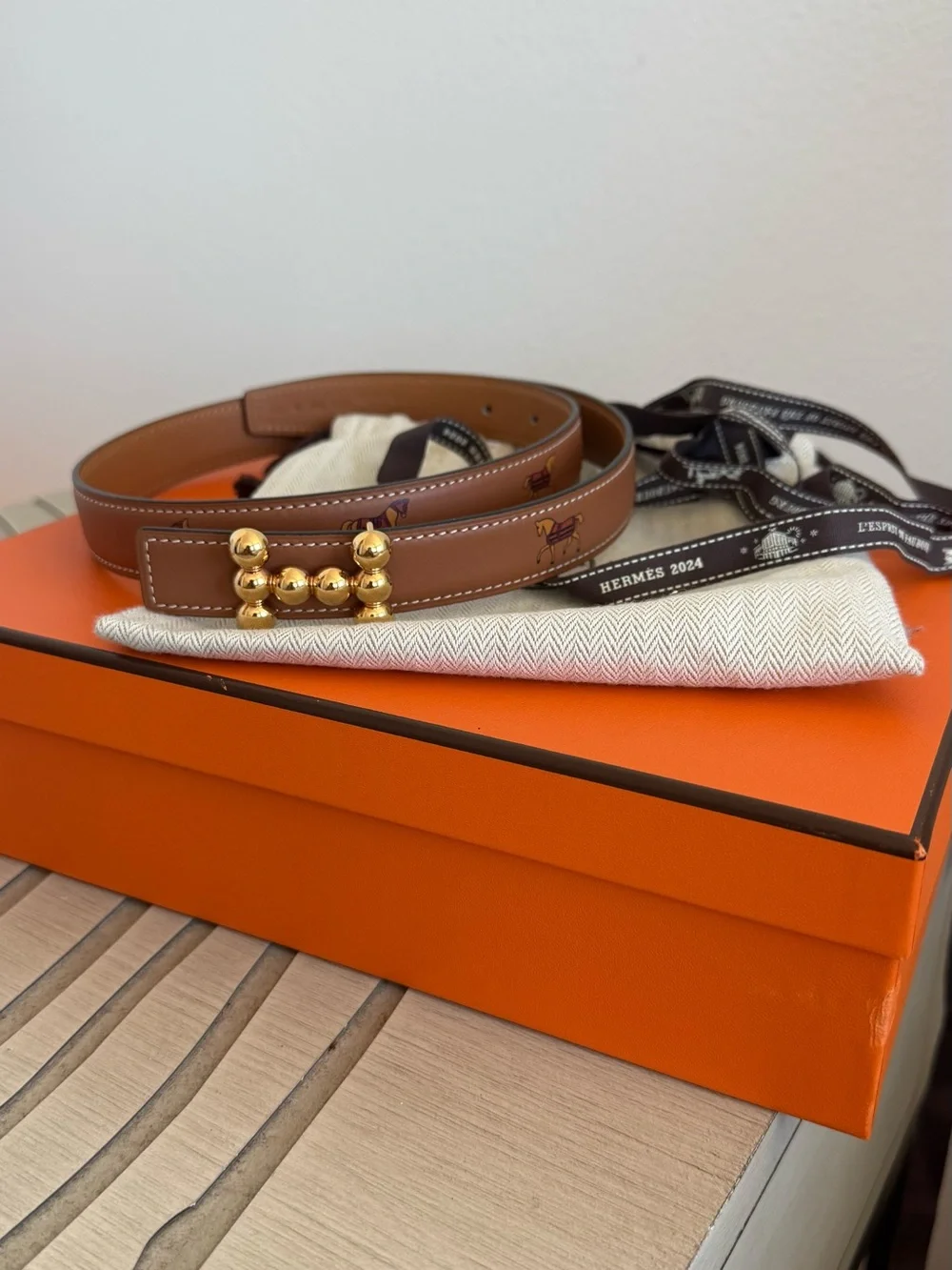 Extremely rare Hermès H bubble revisible leather belt with horse motif